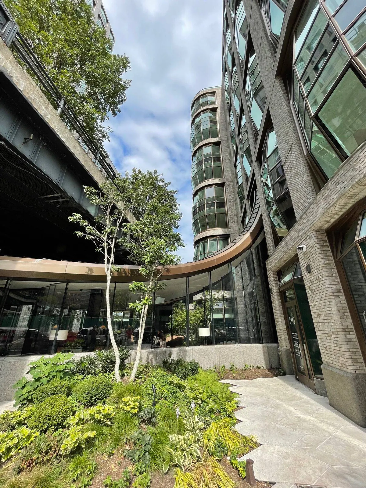 The exterior of a luxury apartment building.