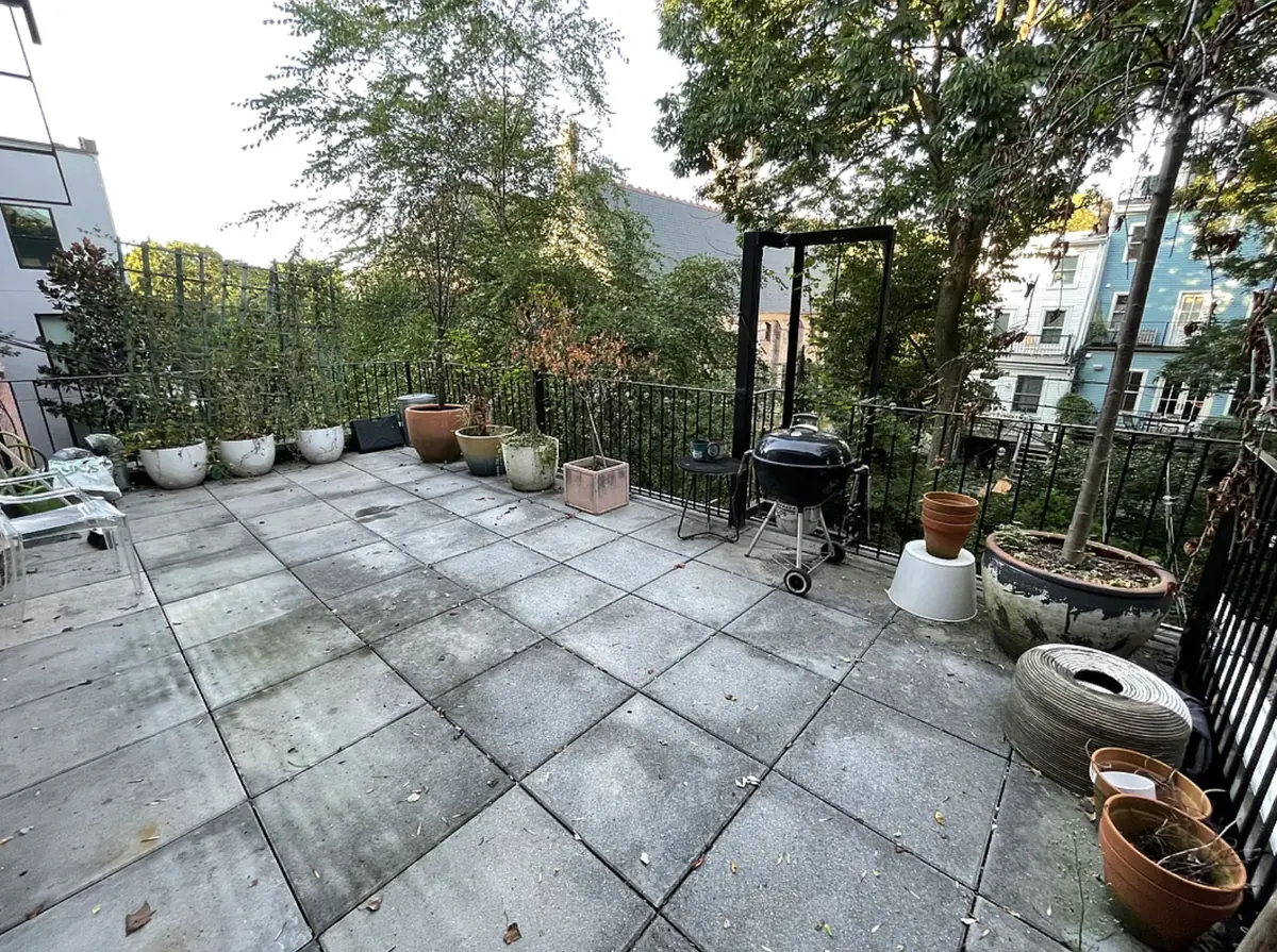 The outdoor patio of a luxury apartment.